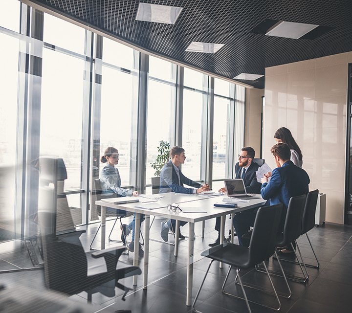 Corporate business team and manager in a meeting